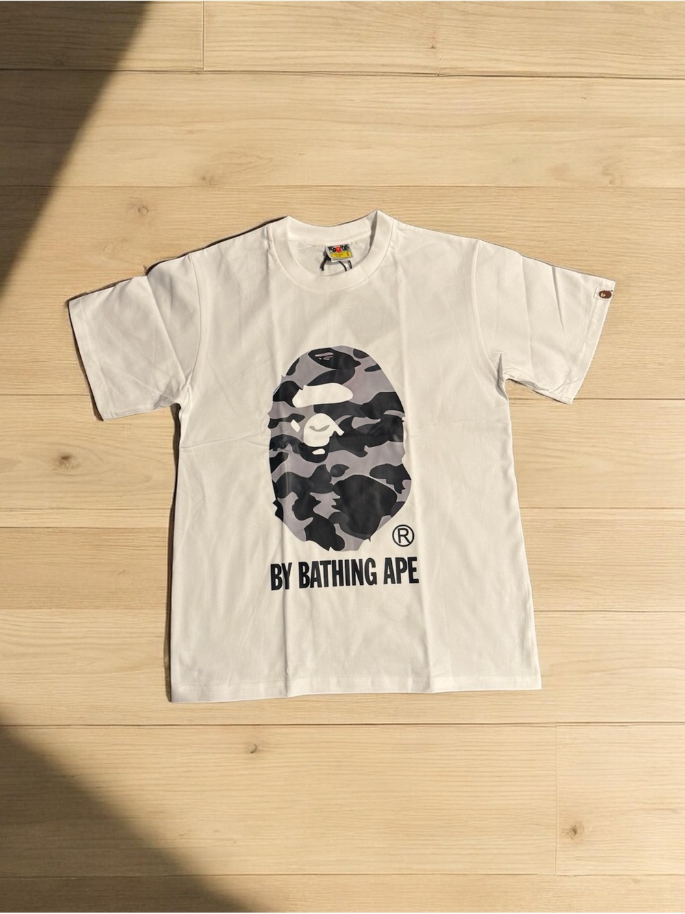 BAPE Graphic Tee - White with Black/Grey Camo Ape Logo